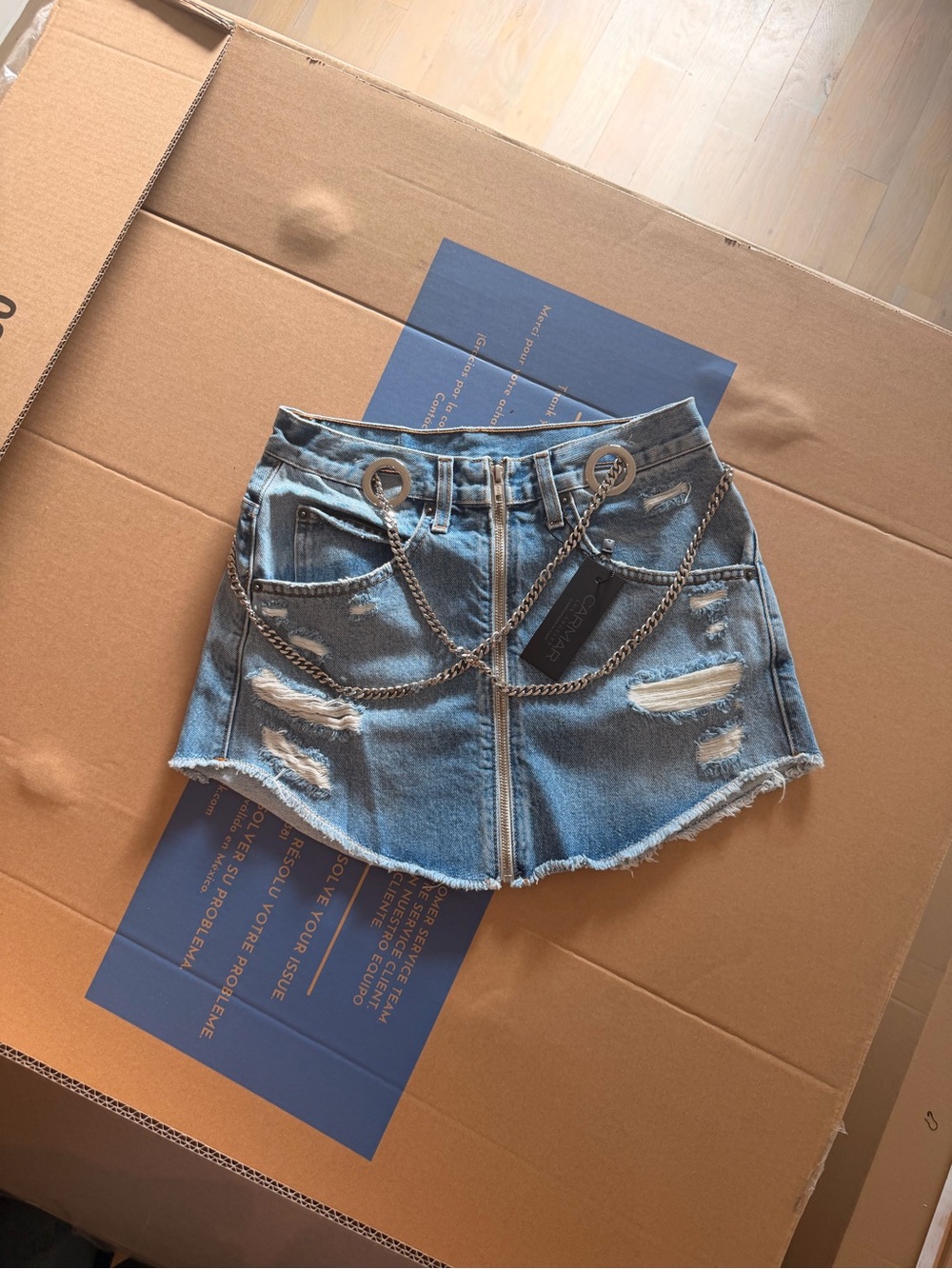 Carmar Light Blue Distressed Denim Mini Skirt with Silver Chain